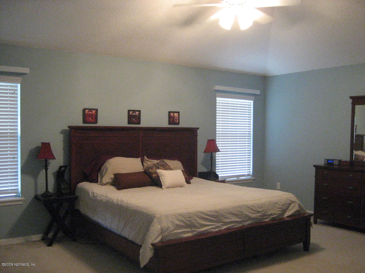 2933 Turning Leaf Lane Jacksonville, FL 32221 - Photo 8 of 15 a bedroom with a bed and window