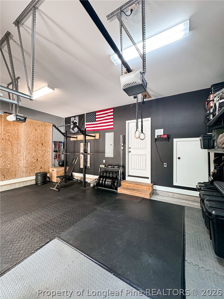 93 Falcon Ridge Drive Spring Lake, NC 28390 - Photo 43 of 50 a view of a room with gym equipment