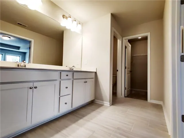 a view of room with window and hardwood floor