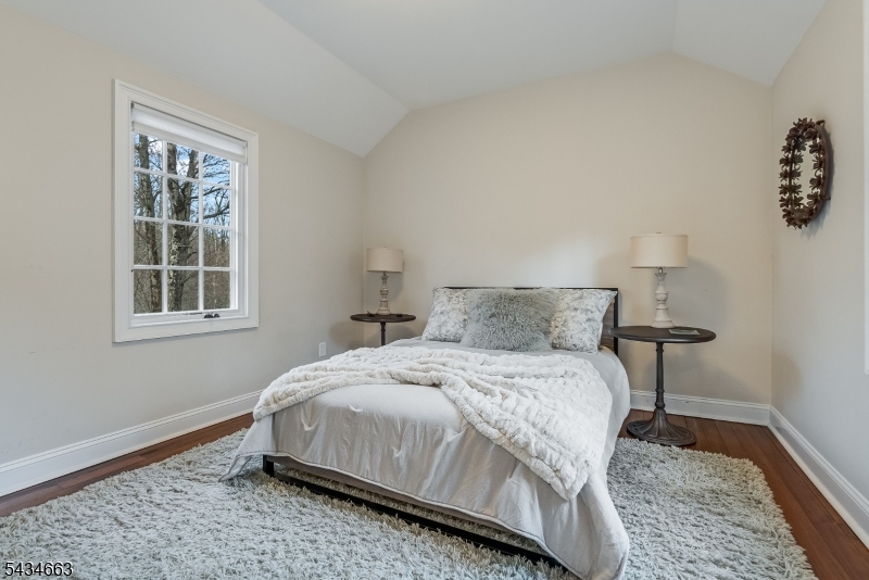 55 State Park Road Chester, NJ 07930 - Photo 36 of 48 a bedroom with a bed and a window