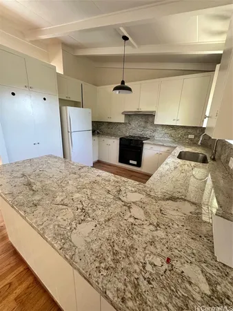 a view of kitchen and microwave