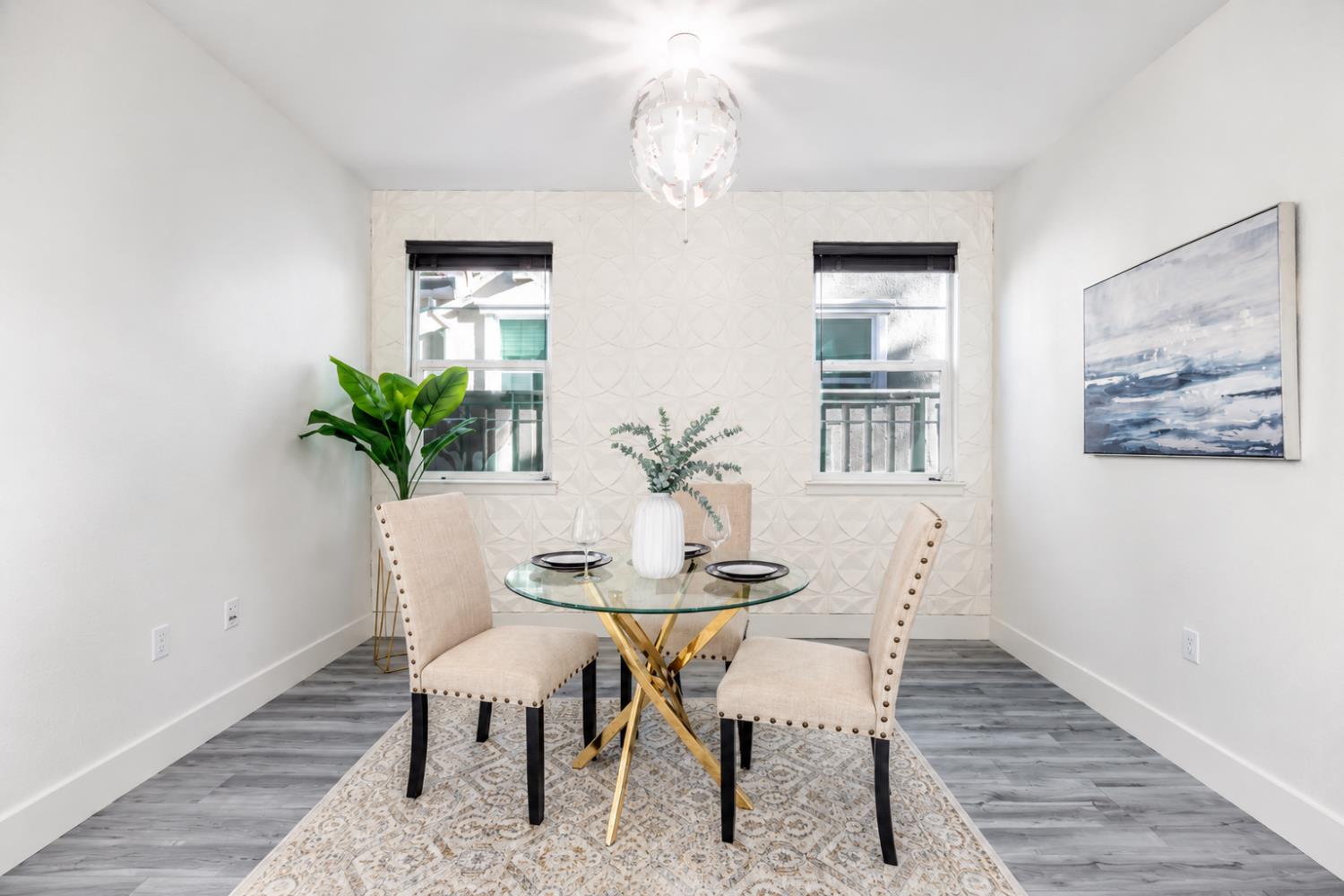 1837 South La Barbera Avenue Mountain House, CA 95391 - Photo 11 of 54 a dining room with furniture and chandelier