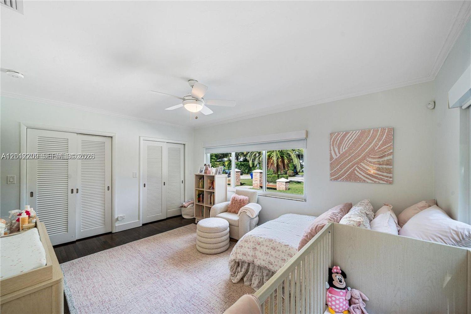 530 Sabal Palm Road Miami, FL 33137 - Photo 11 of 30 a living room with furniture and a large window