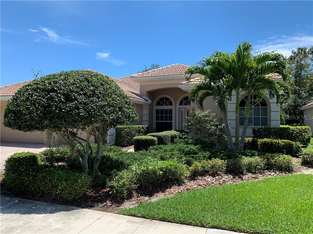 626 Rivendell Boulevard Osprey, FL 34229 - Photo 1 of 1 Mature landscape, private well for irrigation.