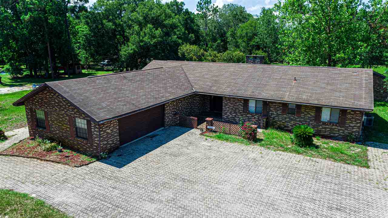 540 Ray Edwards Road St. Augustine, FL 32086 - Photo 1 of 19 All brick 3/2.5 pool home with paved circular drive way and brick shed, advanced water system, brick fire place