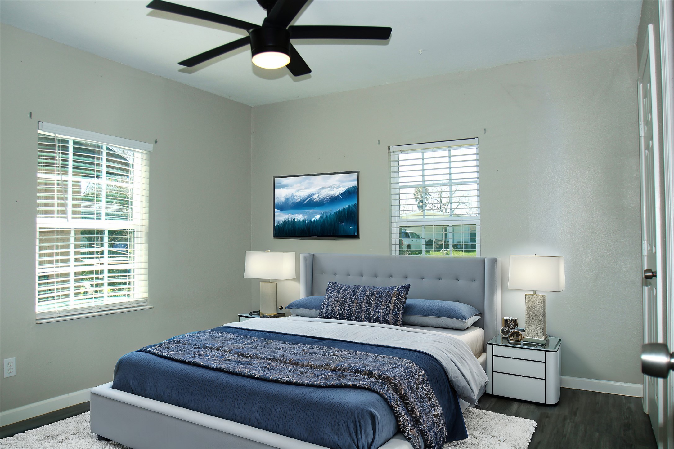 817 South Morgan Street Angleton, TX 77515 - Photo 8 of 16 a bedroom with a bed and a window