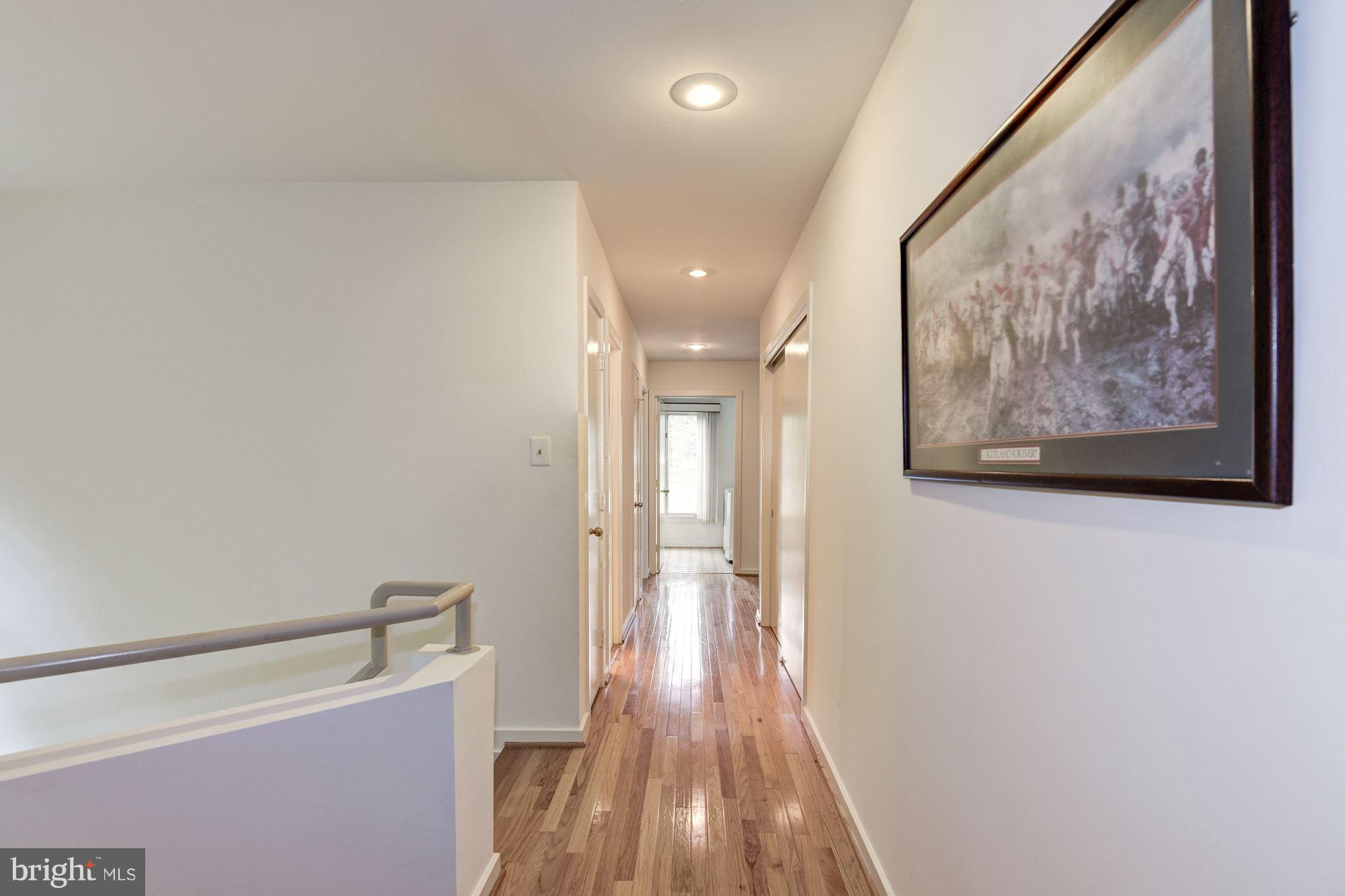 1658 Wild Pine Way Reston, VA 20194 - Photo 18 of 30 Hallway to 3 Bedrooms & Separate Laundry