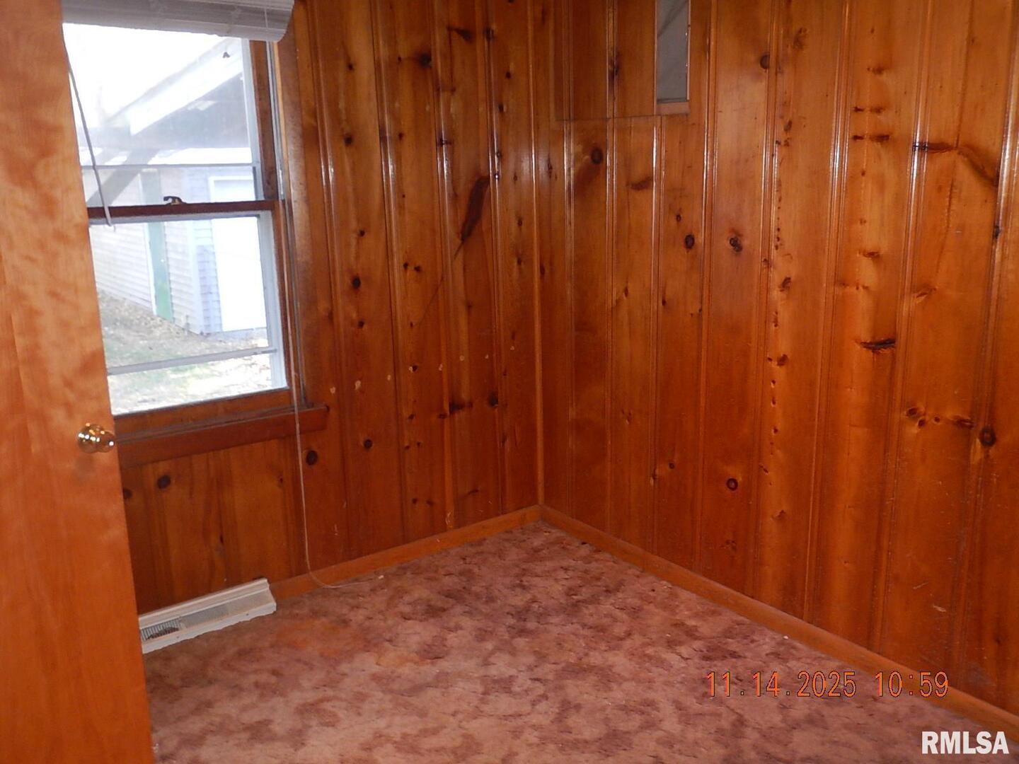 814 4th Street Colona, IL 61241 - Photo 14 of 26 a view of an empty room and window