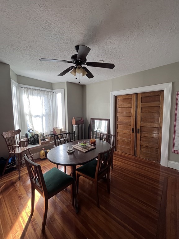 23 Sumner Terrace Springfield, MA 01108 - Photo 18 of 24 a view of a dining room with furniture window and wooden floor
