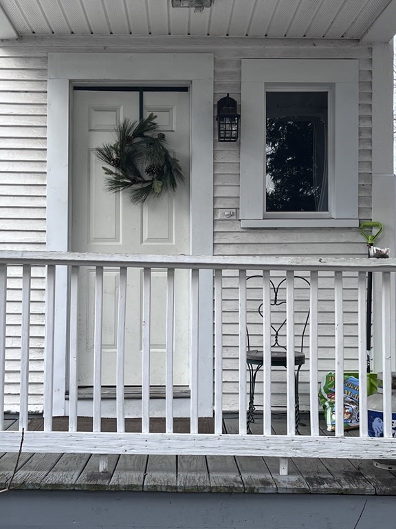 23 Sumner Terrace Springfield, MA 01108 - Photo 5 of 24 a view of front door and a window