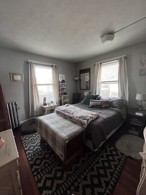 23 Sumner Terrace Springfield, MA 01108 - Photo 8 of 24 a bedroom with bed and window