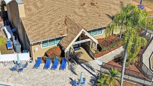 a view of a swimming pool with an ocean and mountain view