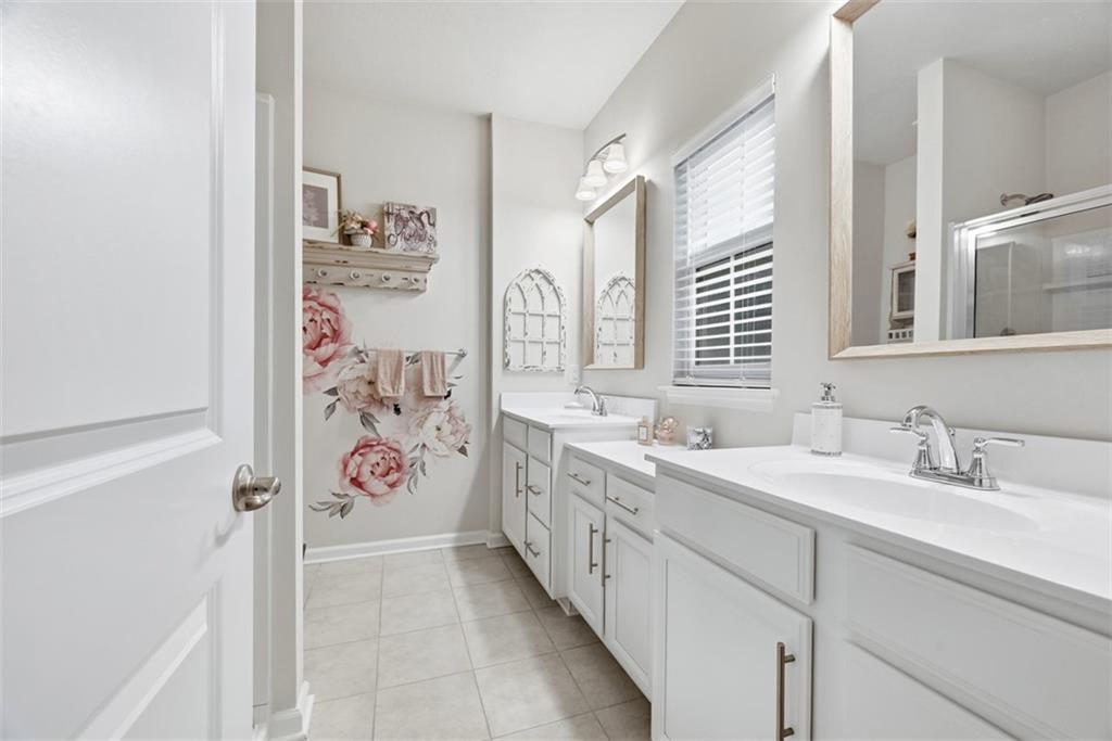 102 Rivulet Place Zelienople, PA 16063 - Photo 22 of 35 a bathroom with a double vanity sink mirror and double
