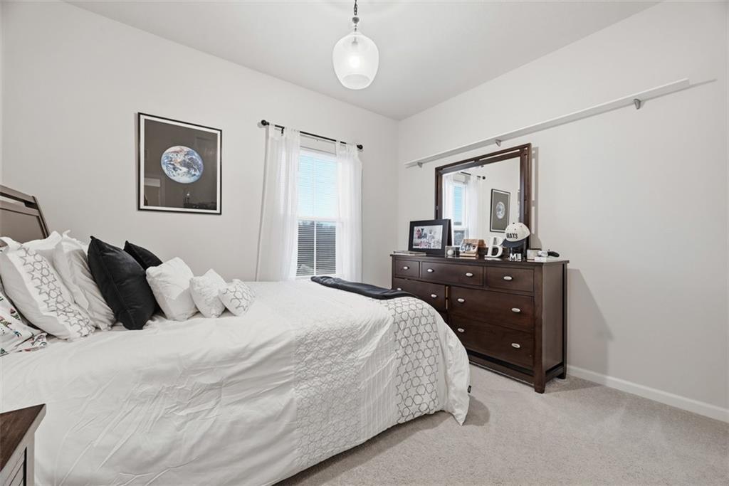102 Rivulet Place Zelienople, PA 16063 - Photo 24 of 35 a bedroom with a bed and a dresser