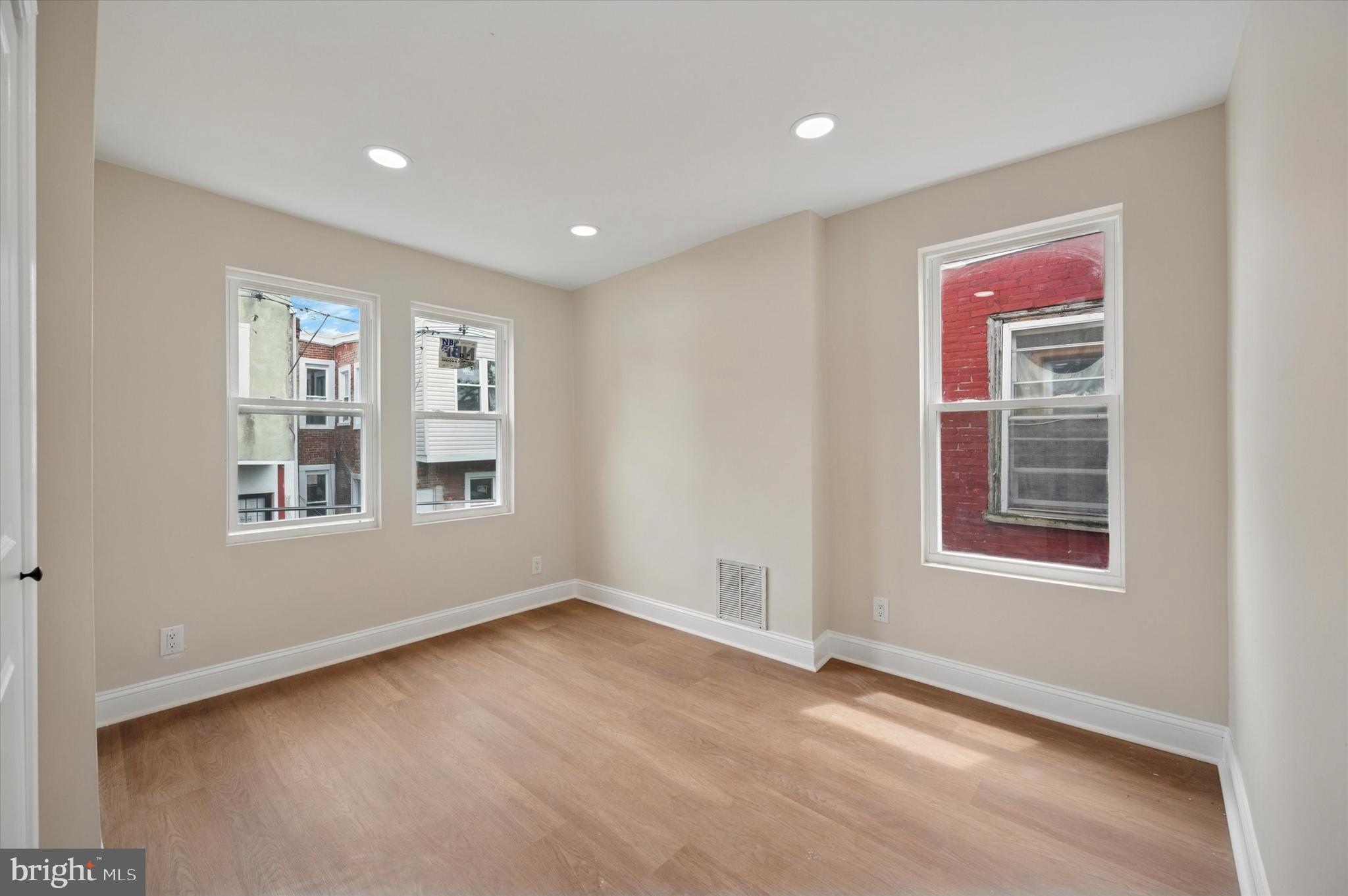 5617 Walton Avenue Philadelphia, PA 19143 - Photo 12 of 28 a view of an empty room with a window