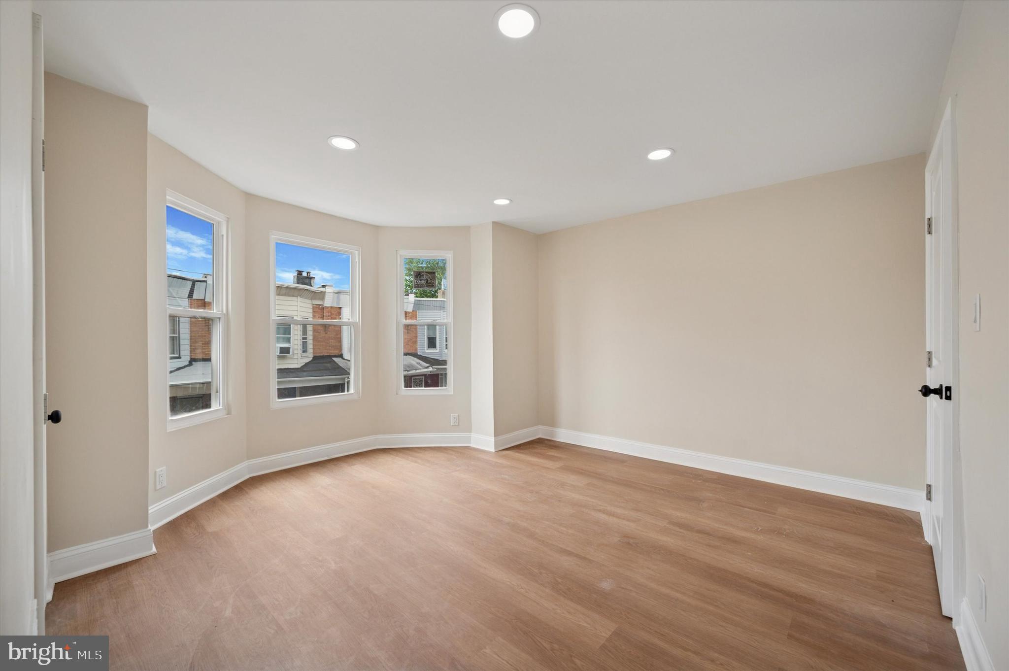 5617 Walton Avenue Philadelphia, PA 19143 - Photo 17 of 28 a view of an empty room with a window