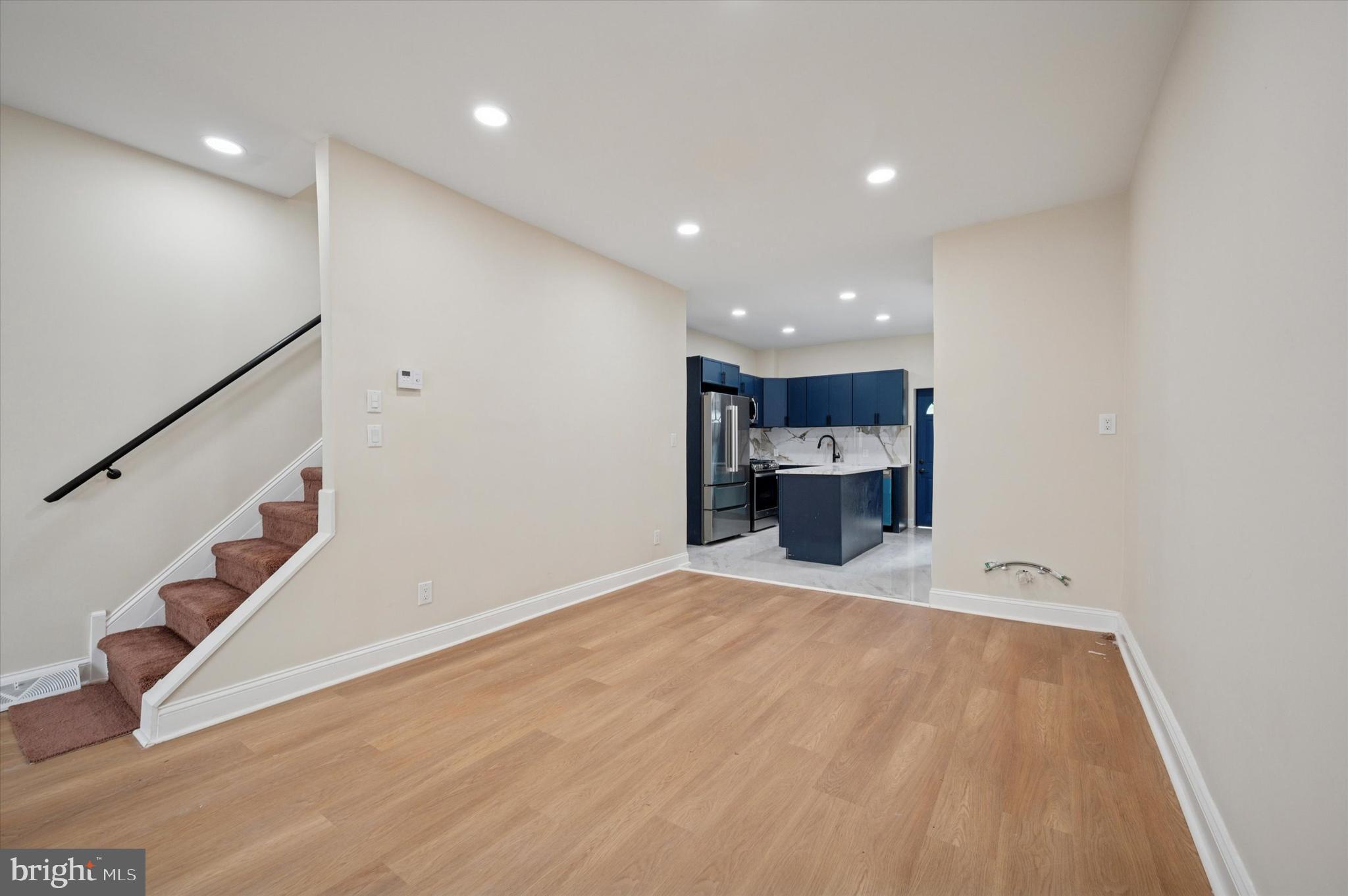 5617 Walton Avenue Philadelphia, PA 19143 - Photo 7 of 28 a view of a kitchen with a sink and cabinets