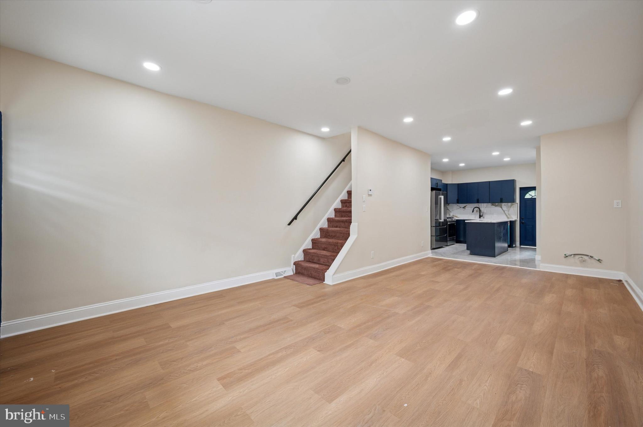 5617 Walton Avenue Philadelphia, PA 19143 - Photo 9 of 28 a view of empty room with wooden floor