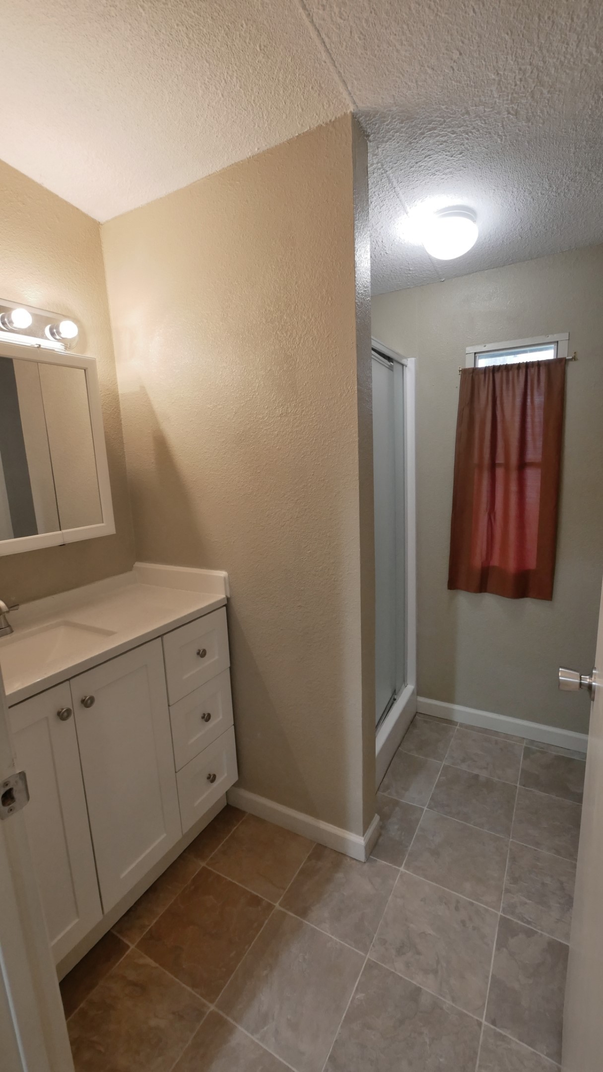 1815 Leaman Avenue, Unit 1 Rosenberg, TX 77471 - Photo 10 of 13 Bathroom with Stand-Up Shower