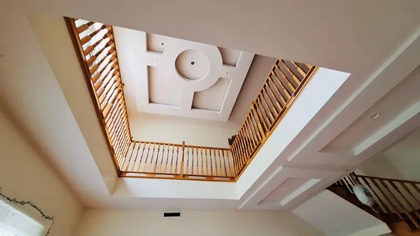 a bedroom with bed and a closet