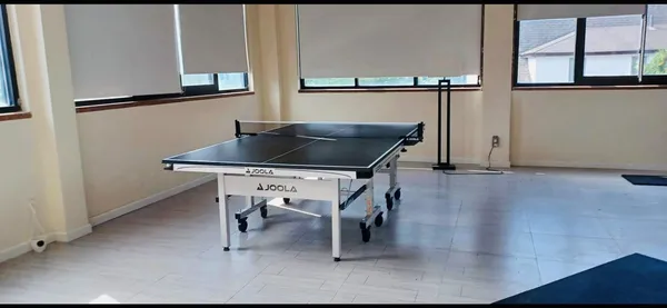 a bathroom with a toilet and a mirror