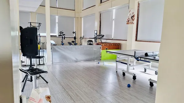 a view of a room with gym equipment