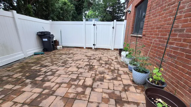 a view of a deck with mountain view and wooden floor