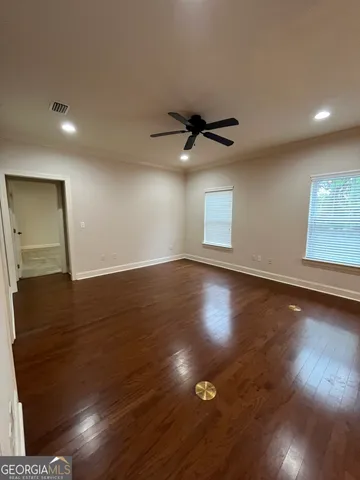 a view of room window and wooden floor