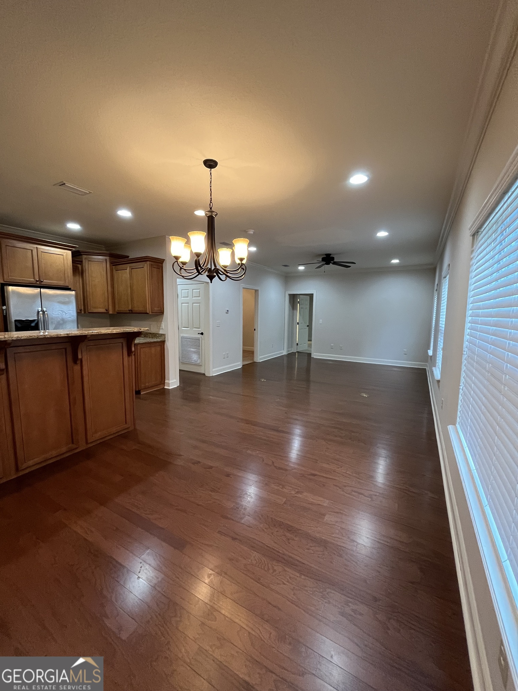 708 Osborne Street, Unit 206 St. Marys, GA 31558 - Photo 9 of 27 a view of a kitchen with a sink and microwave