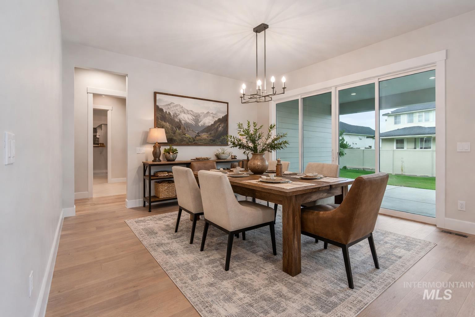 2147 East Blakehurst Avenue Kuna, ID 83634 - Photo 16 of 43 Dining space with light wood-type flooring and suspended lighting