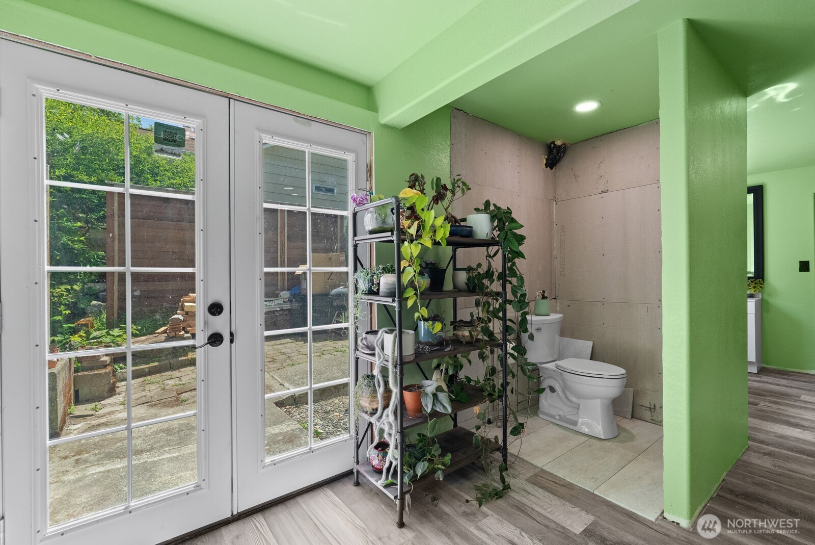 307 4th Street Steilacoom, WA 98388 - Photo 26 of 39 a view of bathroom with a toilet and a potted plant