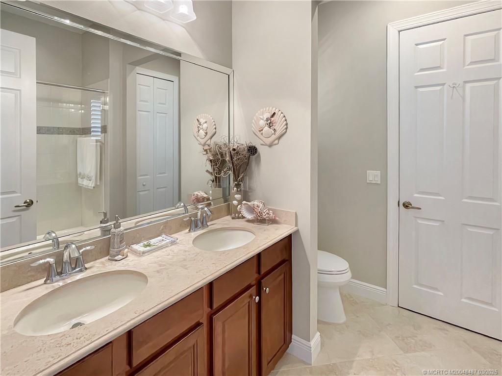 443 Southwest Lost River Road Stuart, FL 34997 - Photo 29 of 34 Bath between BRs 2 & 3