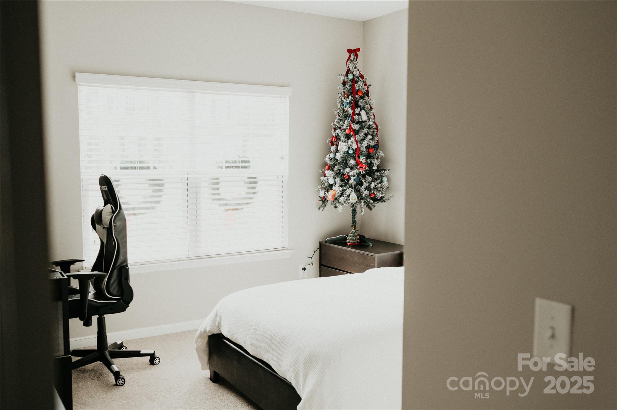 155 Autumn Mist Road Statesville, NC 28677 - Photo 15 of 23 a bedroom with a bed and a window