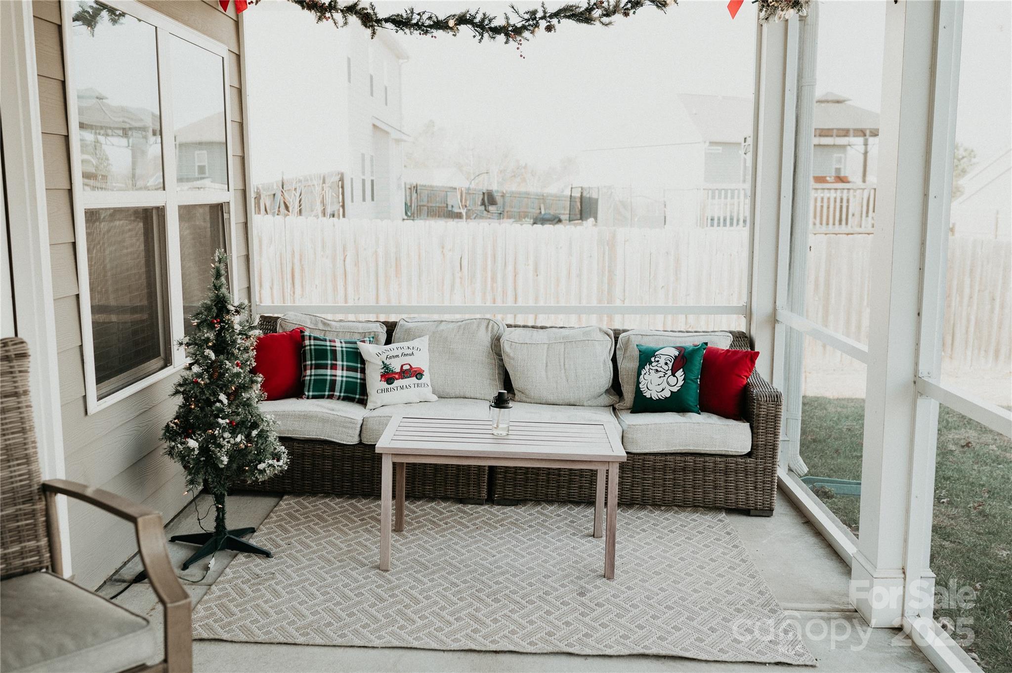 155 Autumn Mist Road Statesville, NC 28677 - Photo 18 of 23 a living room with furniture and a potted plant