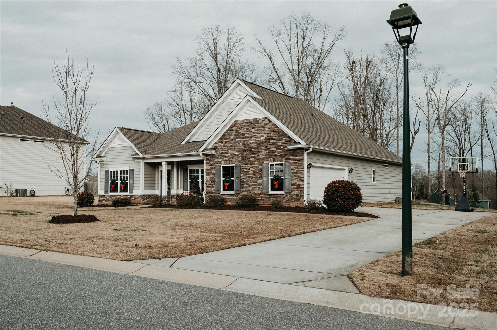 155 Autumn Mist Road Statesville, NC 28677 - Photo 2 of 23 a view of a house with a yard and garage