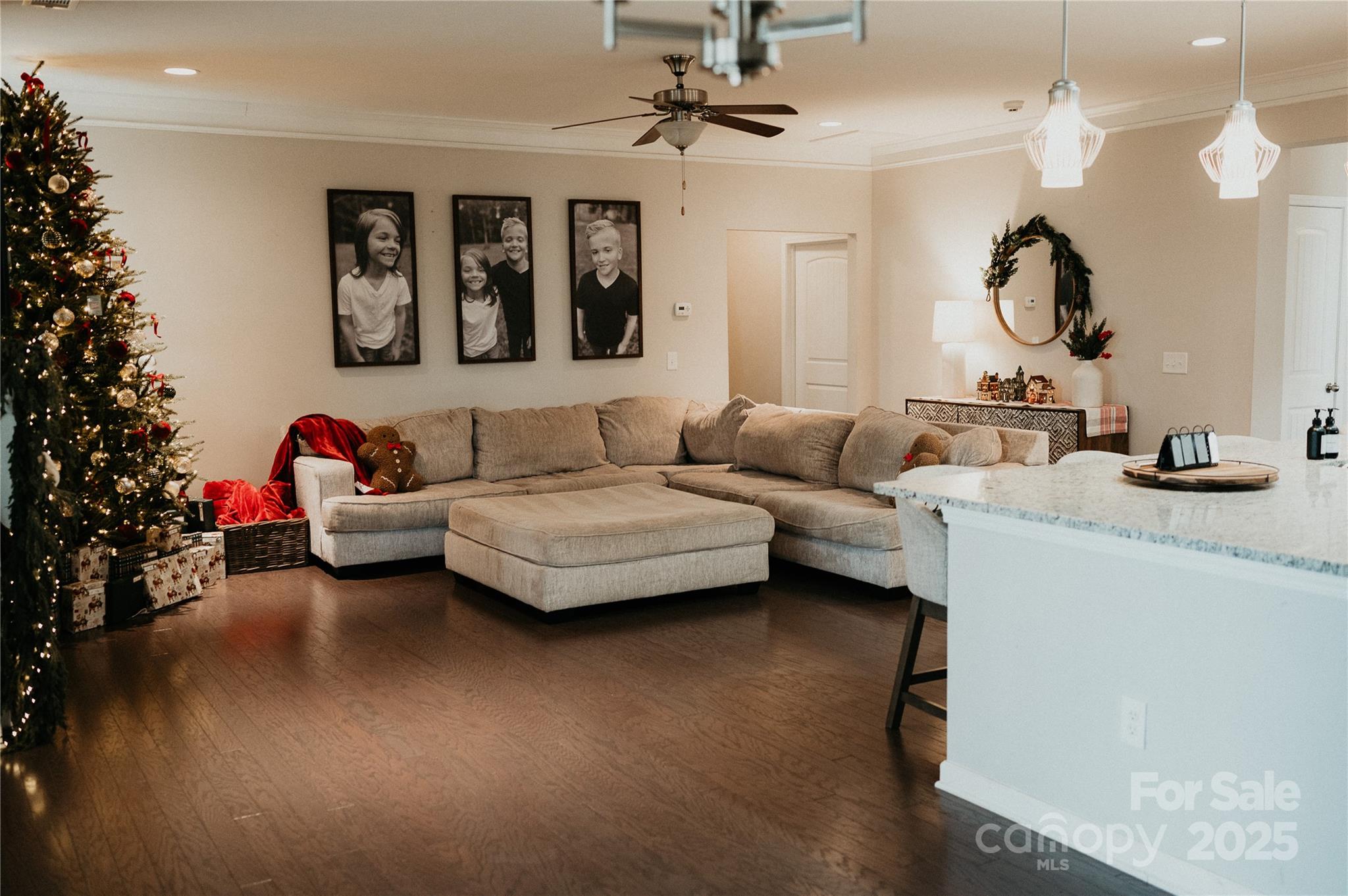 155 Autumn Mist Road Statesville, NC 28677 - Photo 8 of 23 a living room with furniture a chandelier and a mirror