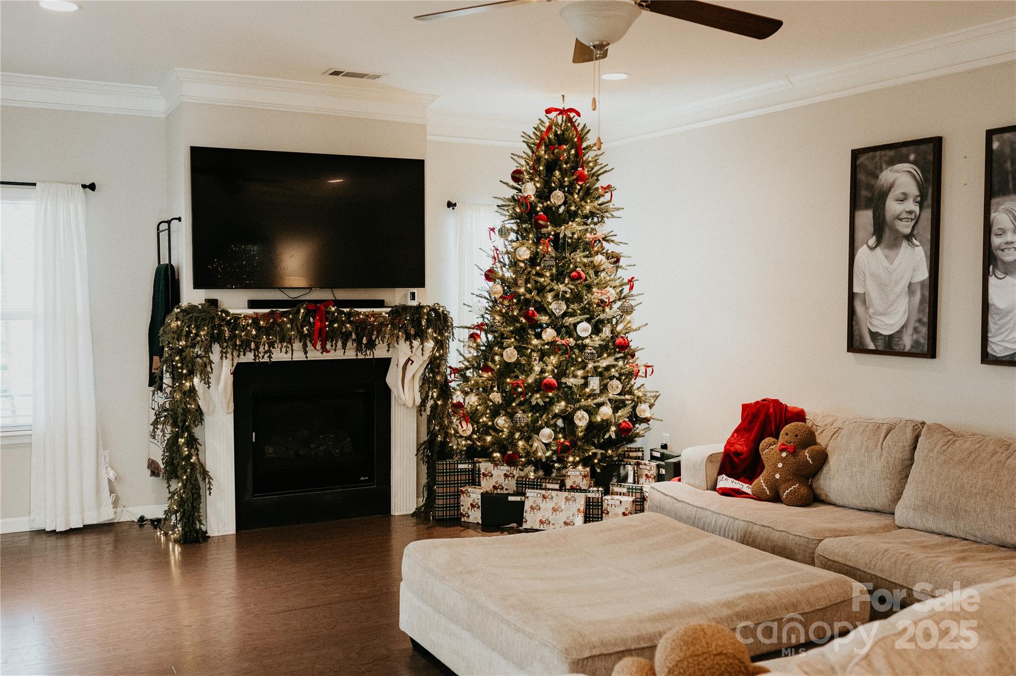 155 Autumn Mist Road Statesville, NC 28677 - Photo 9 of 23 a living room with a flat screen tv and a fireplace