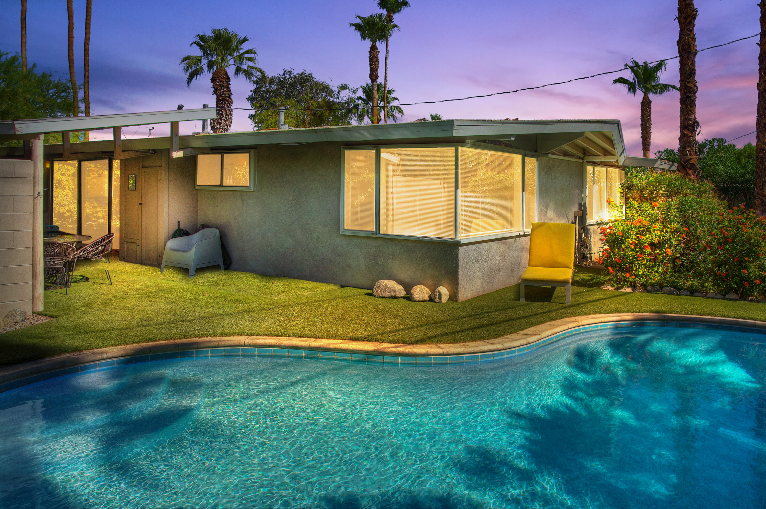 a swimming pool with yard