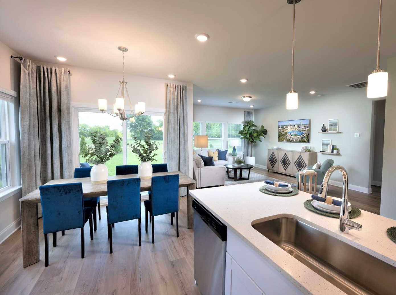 7413 Blue Gable Road Hermitage, TN 37076 - Photo 10 of 13 a kitchen with a table chairs and refrigerator