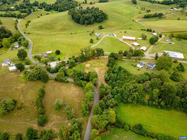 a view of a lake with a houses
