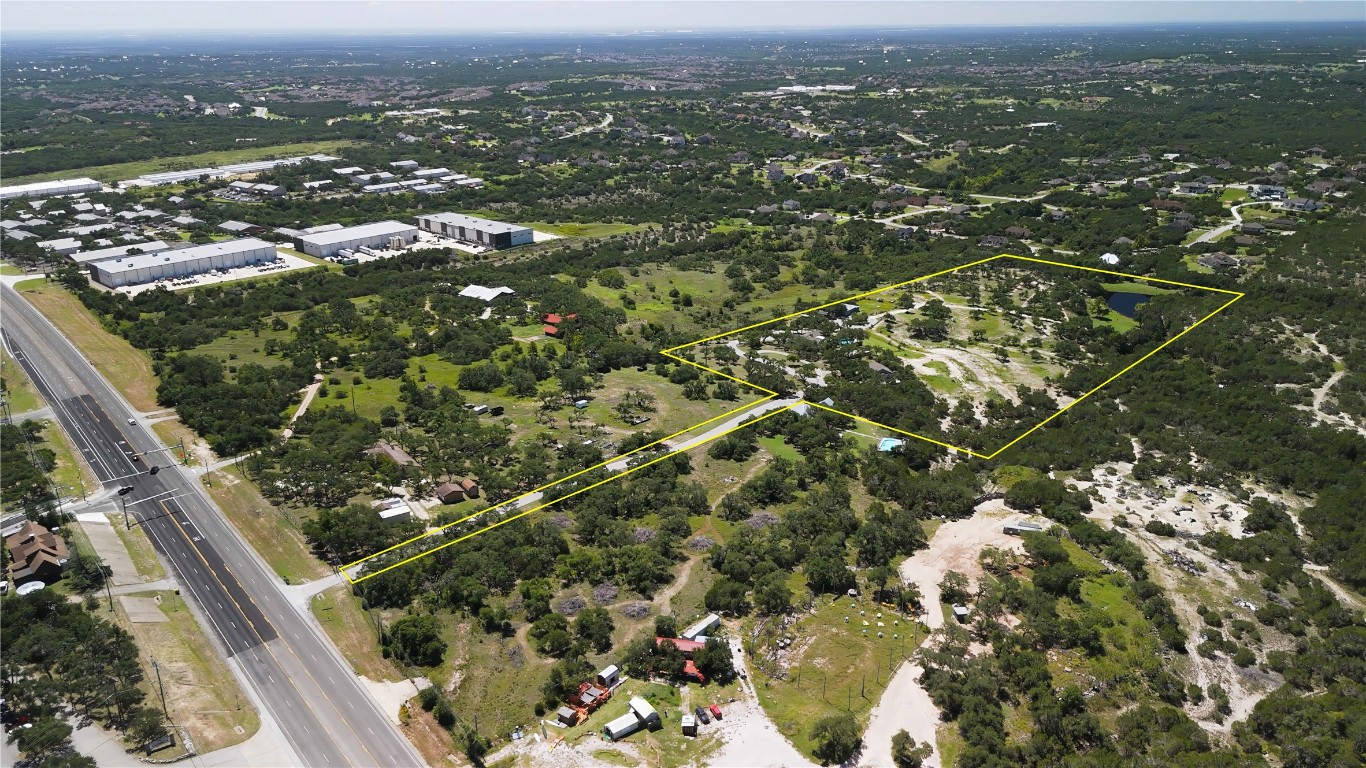 110 Longhorn Lane Dripping Springs, TX 78620 - Photo 3 of 40 an aerial view of residential houses with city view