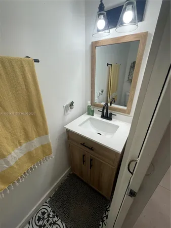 a bathroom with a toilet and a sink