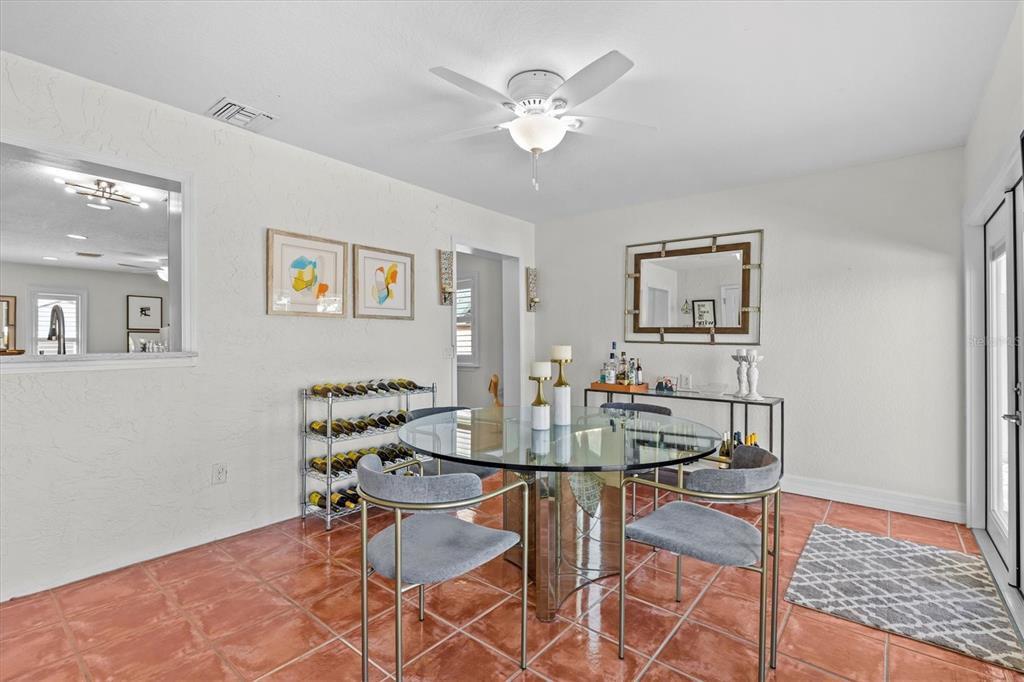 3391 Mangrove Drive Hernando Beach, FL 34607 - Photo 32 of 52 a view of a dining room with furniture