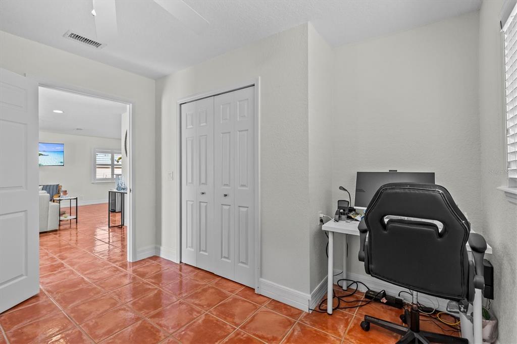 3391 Mangrove Drive Hernando Beach, FL 34607 - Photo 39 of 52 a view of room with workspace and wooden floor