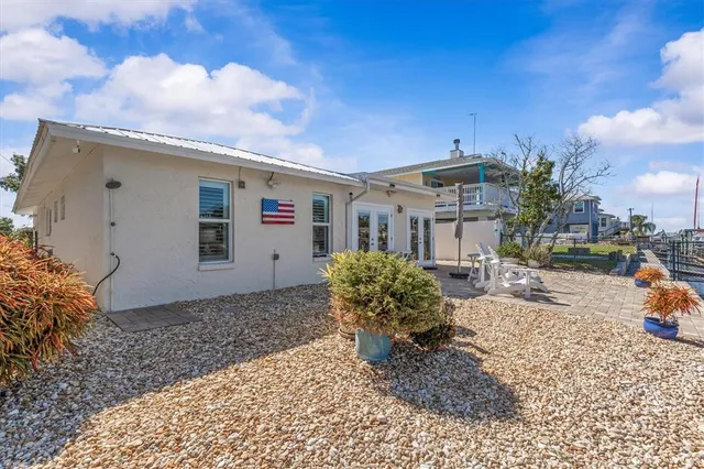 a view of swimming pool with outdoor seating