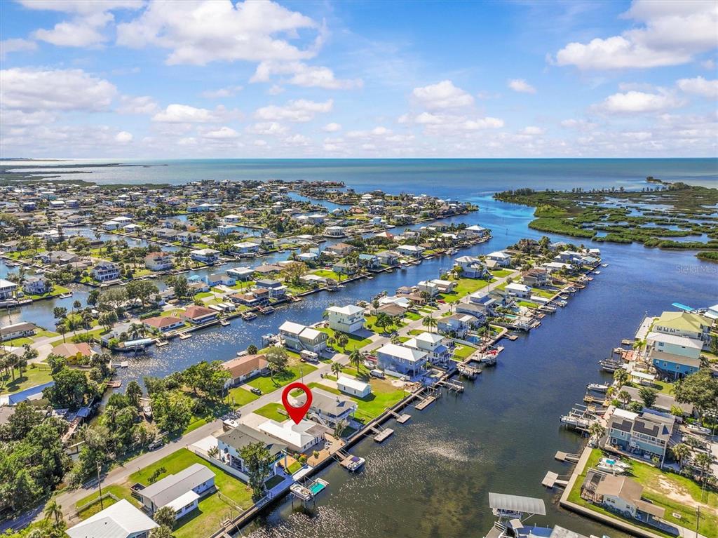 3391 Mangrove Drive Hernando Beach, FL 34607 - Photo 5 of 52 an aerial view of a city