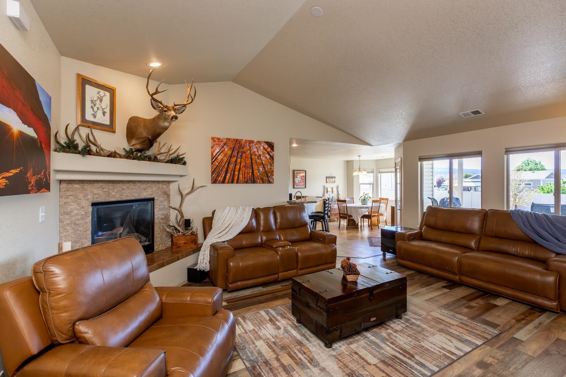 103 Red Rocks Street Fruita, CO 81521 - Photo 17 of 39 a living room with furniture fireplace and a window