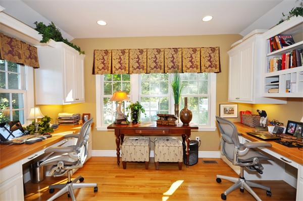 31 MacArthur Road Concord, MA 01742 - Photo 12 of 30 a living room with furniture and a floor to ceiling window or couch