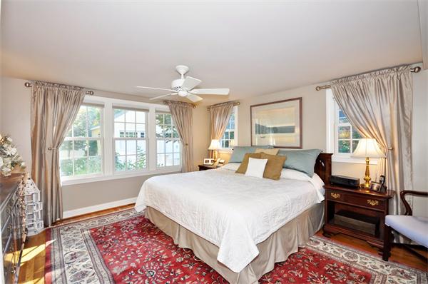 31 MacArthur Road Concord, MA 01742 - Photo 14 of 30 a bedroom with a large bed and a window