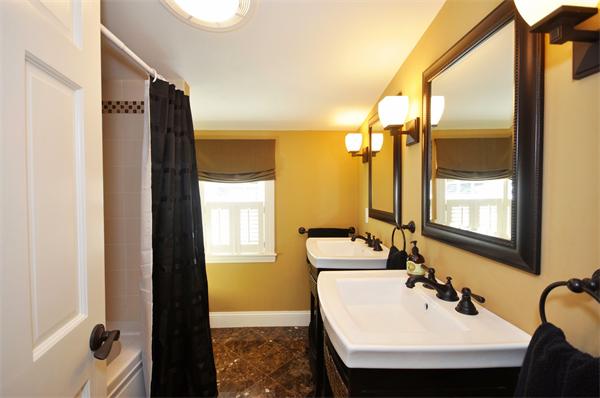 31 MacArthur Road Concord, MA 01742 - Photo 18 of 30 a bathroom with a sink and a mirror